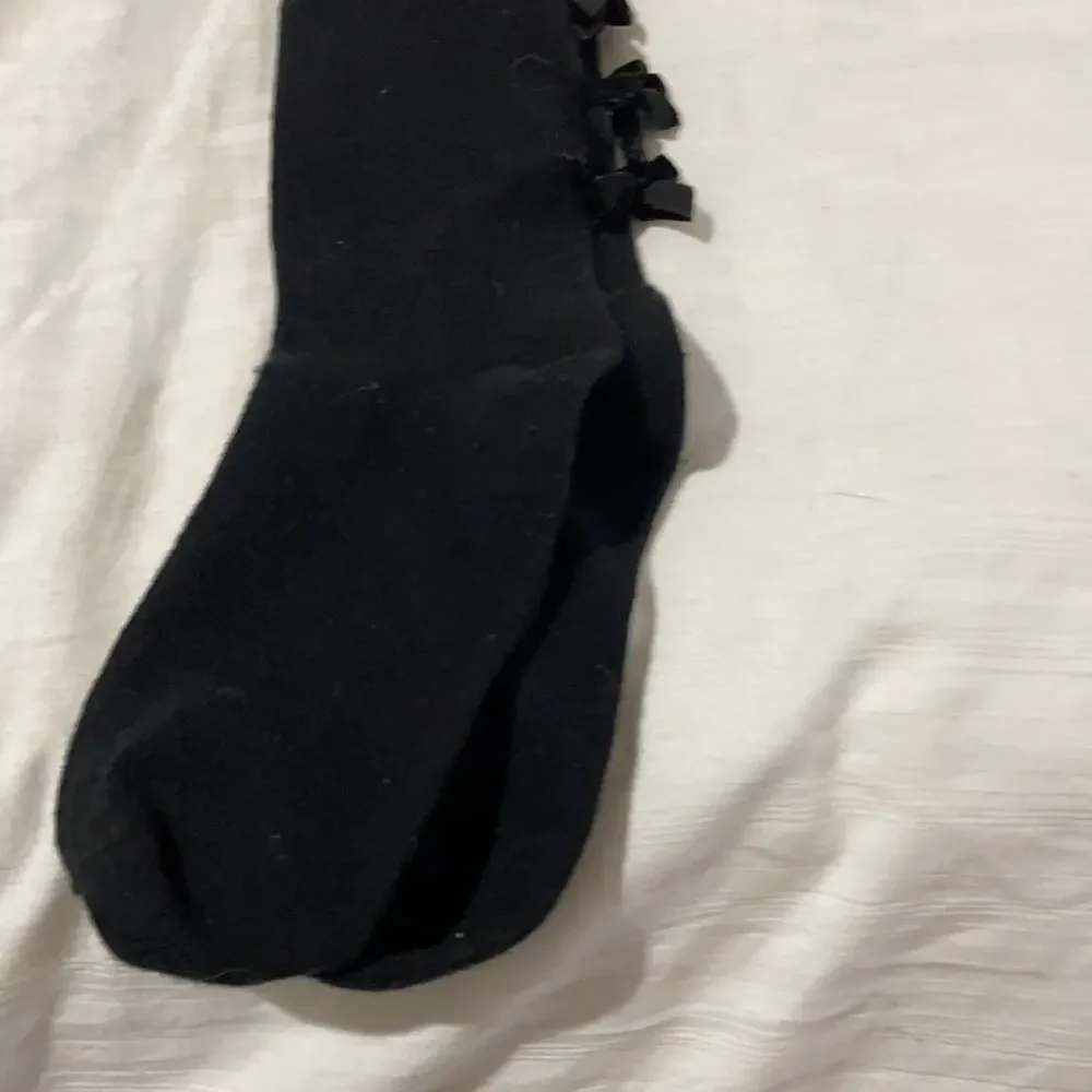 Lili Gaufrette  size 3 tights black and white with back of ankle bows euc